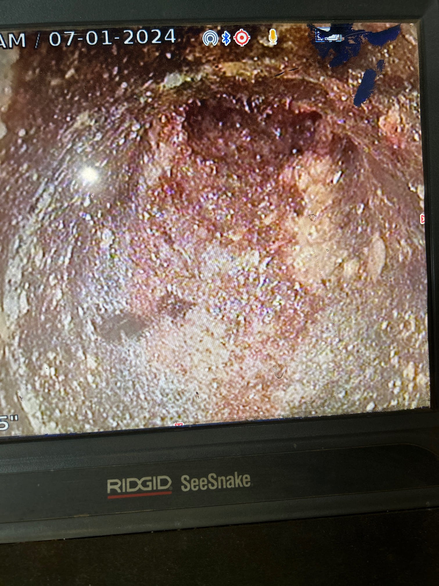 Image related to hot water heater maintenance, possibly showing a natural gas or heating oil-powered unit. Ideal for services offering water heater cleaning and replacement.