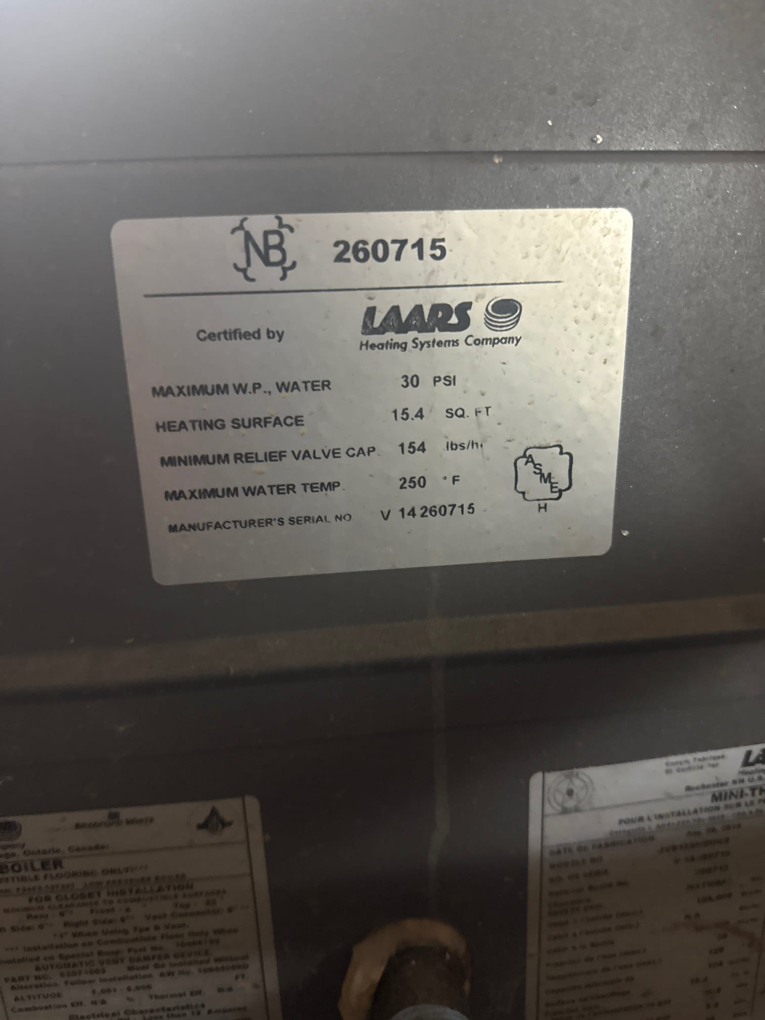 Close-up of an oil combi boiler, similar to a Burnham boiler, highlighting its components. Represents commercial boiler tune-up service #4, ensuring efficient heating and maintenance.