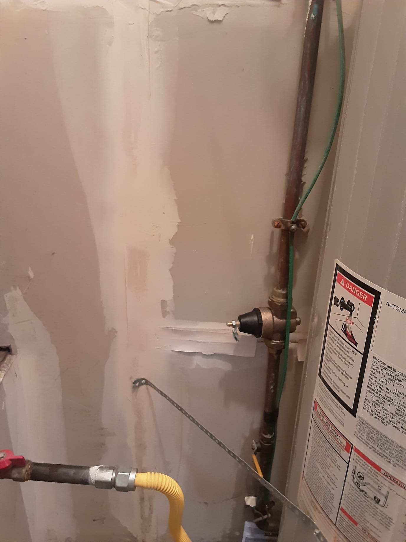 Image depicting commercial water heater repair, relevant for businesses searching for 'commercial heating repair near me' or a comprehensive 'commercial heating and cooling company' for their HVAC needs.