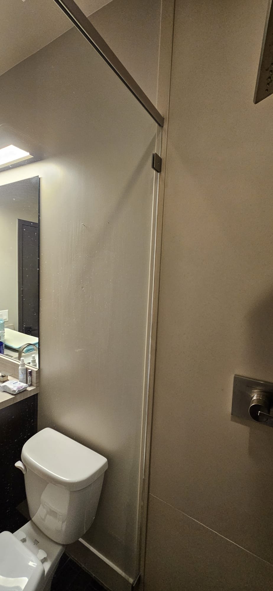 Image depicting commercial bathroom mold remediation, relevant to emergency mold recovery services and bathroom renovation costs. Focus on professional mold removal to avoid extensive and expensive bathroom redo.