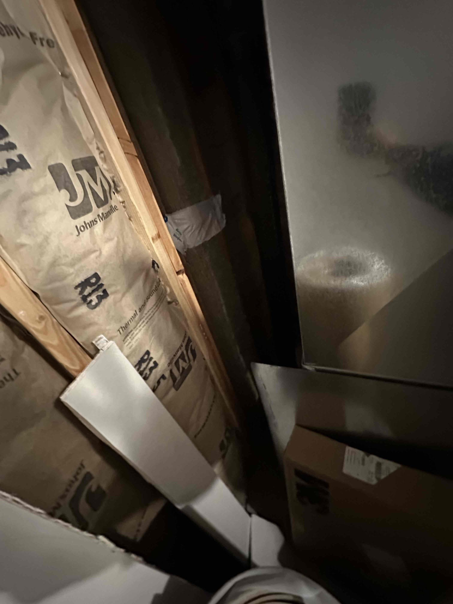 Image depicting a technician repairing an oil furnace, symbolizing 24/7 residential furnace repair service availability for immediate assistance.