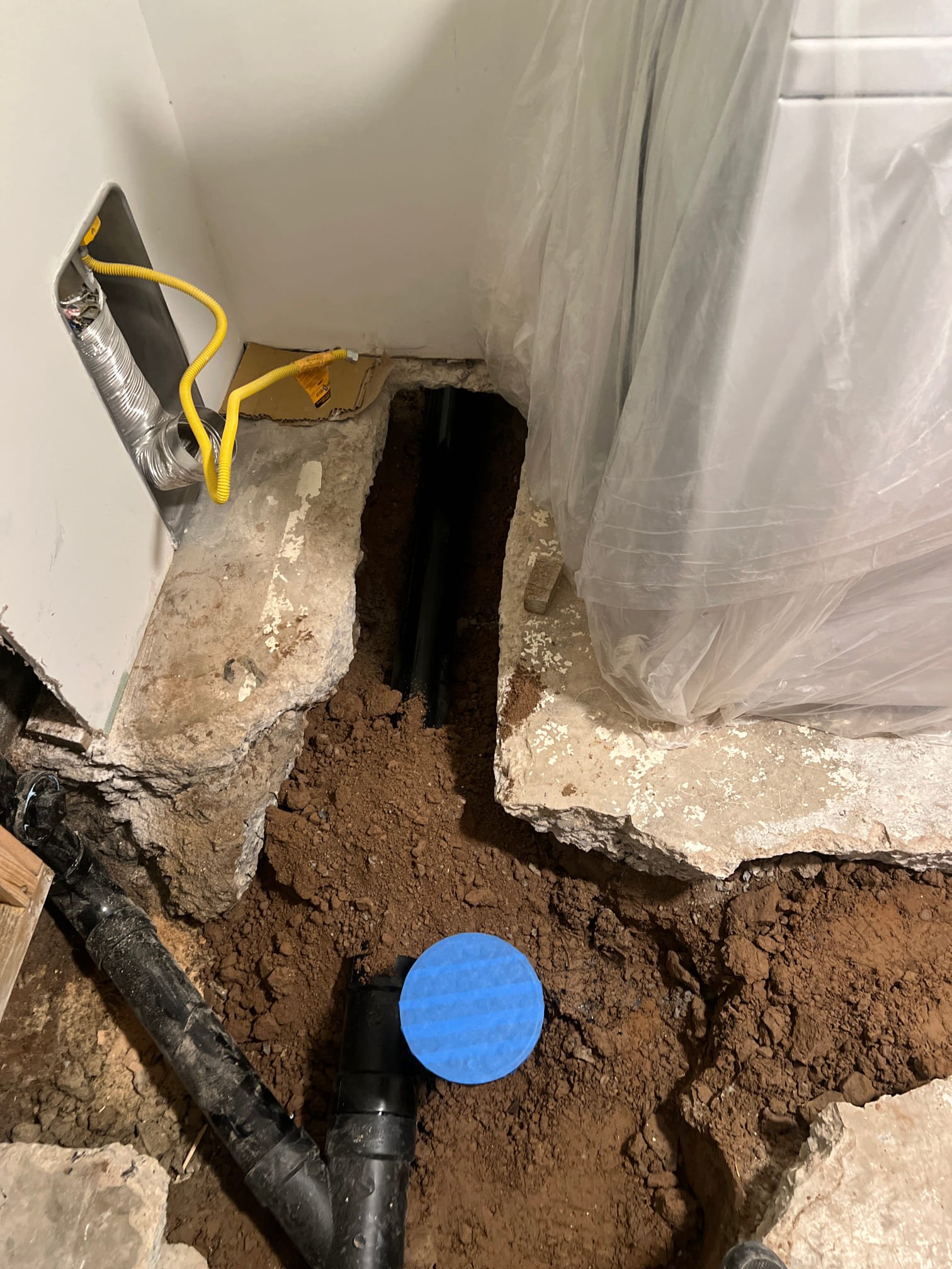 Frustrated person looking at a faucet with no hot water. The image symbolizes the common plumbing problem of having no hot water, potentially due to issues like a faulty water heater or the buildup of mineral deposits from hard water, a frequent cause of water heater failure, especially in apartments.