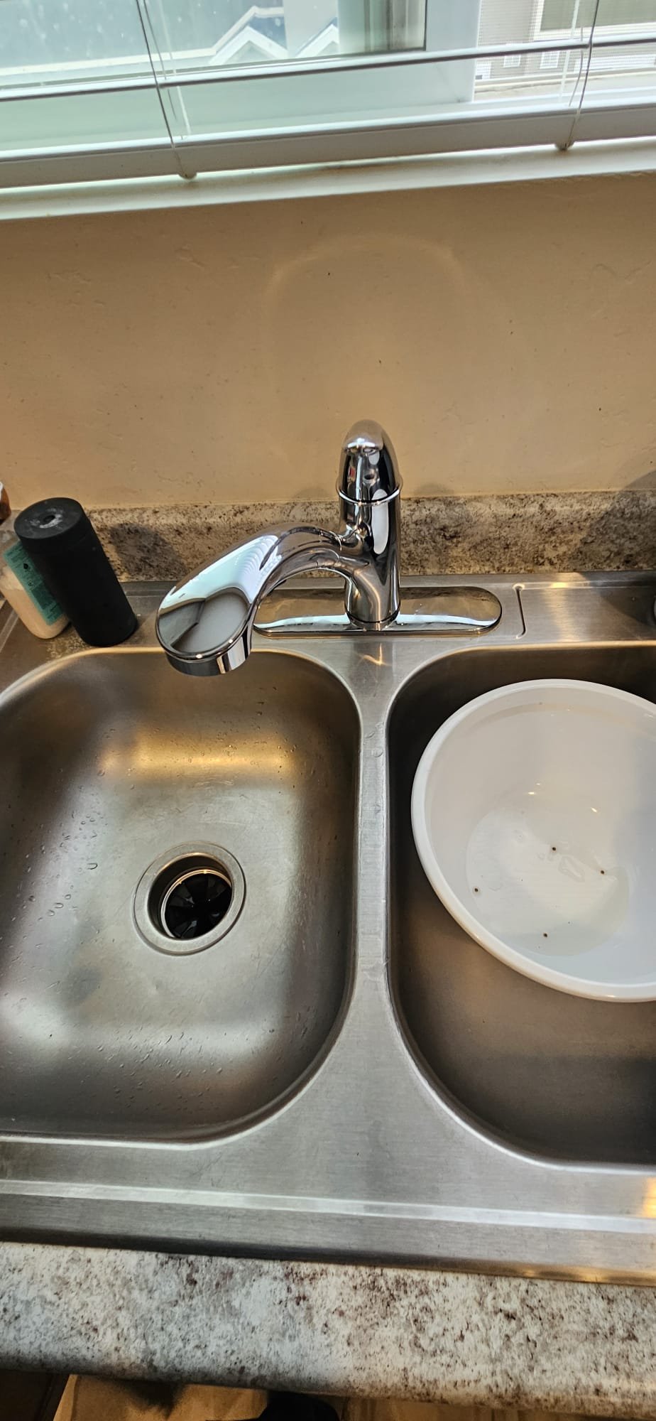 Image showcasing essential tools for faucet replacement, suitable for both sink faucet upgrades and outdoor faucet stem repairs. Includes a wrench, plumber's tape, and possibly a basin wrench, highlighting the necessary equipment for DIY plumbing projects.