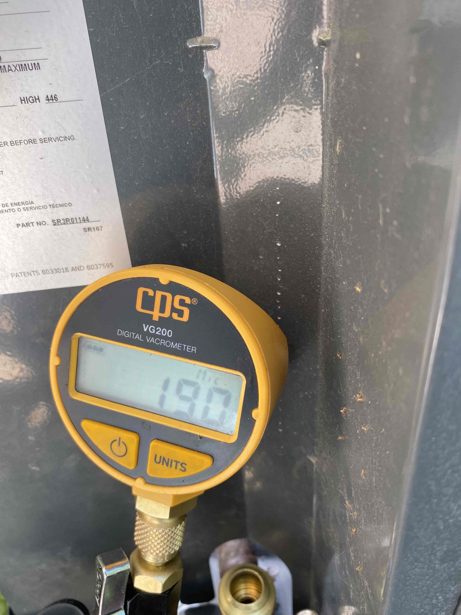 A central air conditioning unit with condensation, symbolizing the need for 'central air unit repair near me' due to 'central air not blowing cold air'. Focus on troubleshooting and AC repair services.