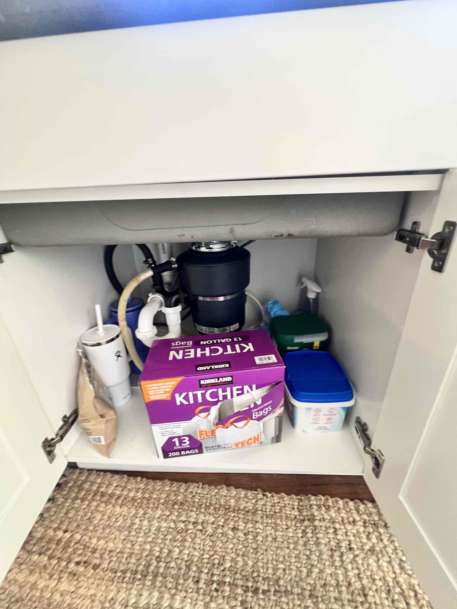 Close-up of basement drywall water damage, highlighting the need for same-day recovery services. Potential causes include shower trap issues. Professional basement drywall water damage recovery near you.