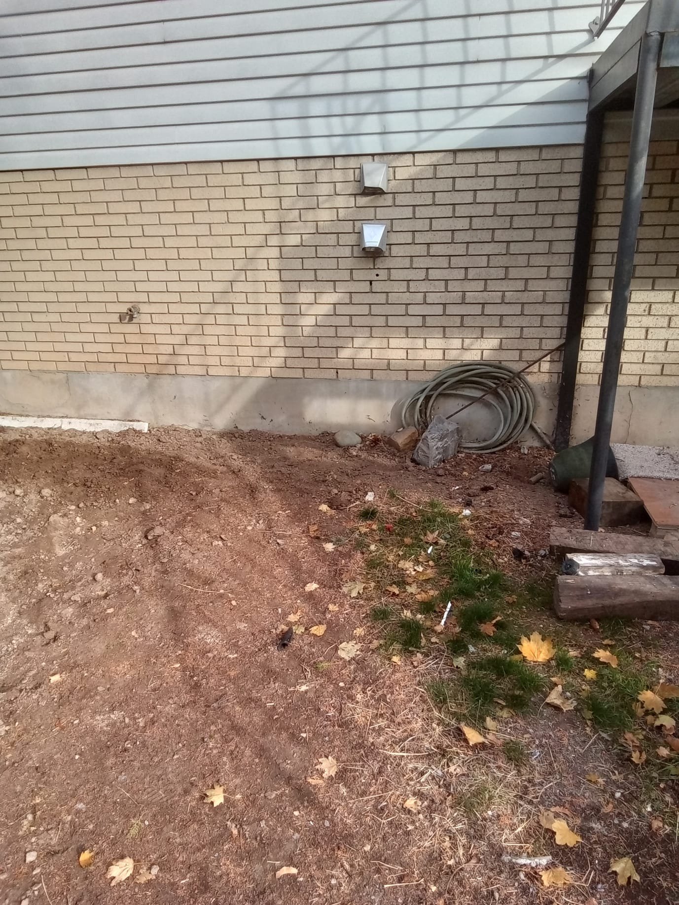 Image depicting basement drywall water damage, potentially caused by plumbing issues like a faulty P-trap. Highlights the costs associated with repair and whether the damage is covered by insurance (insured basement drywall water damage).