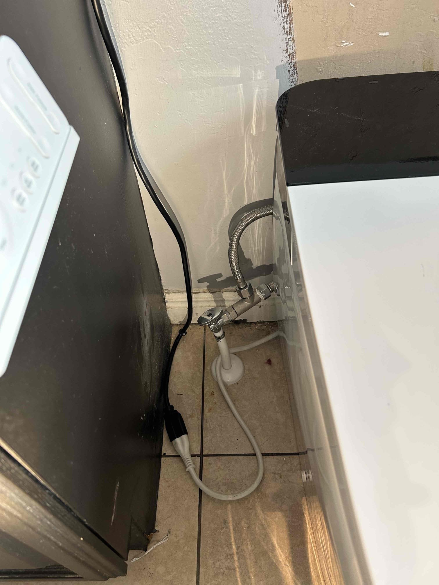 Built-in water filter providing clean water, potentially reducing the need for costly water line repairs and residential water damage repair services due to leaks and sediment buildup.