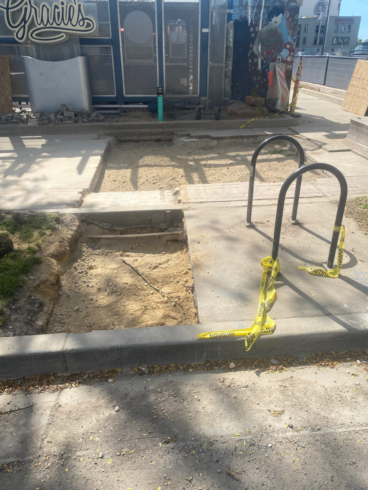 An outdoor wood stove, possibly a small model, stands ready for use, hinting at potential heating or cooking needs after a flood recovery estimate has been considered.