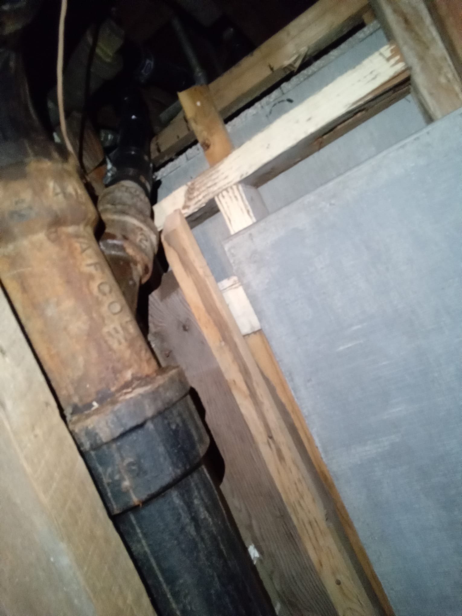 Image depicting routine plumbing maintenance, showcasing elements of a home plumbing system being inspected or repaired. Highlights the importance of home plumbing maintenance for preventing costly repairs and ensuring efficient water usage.