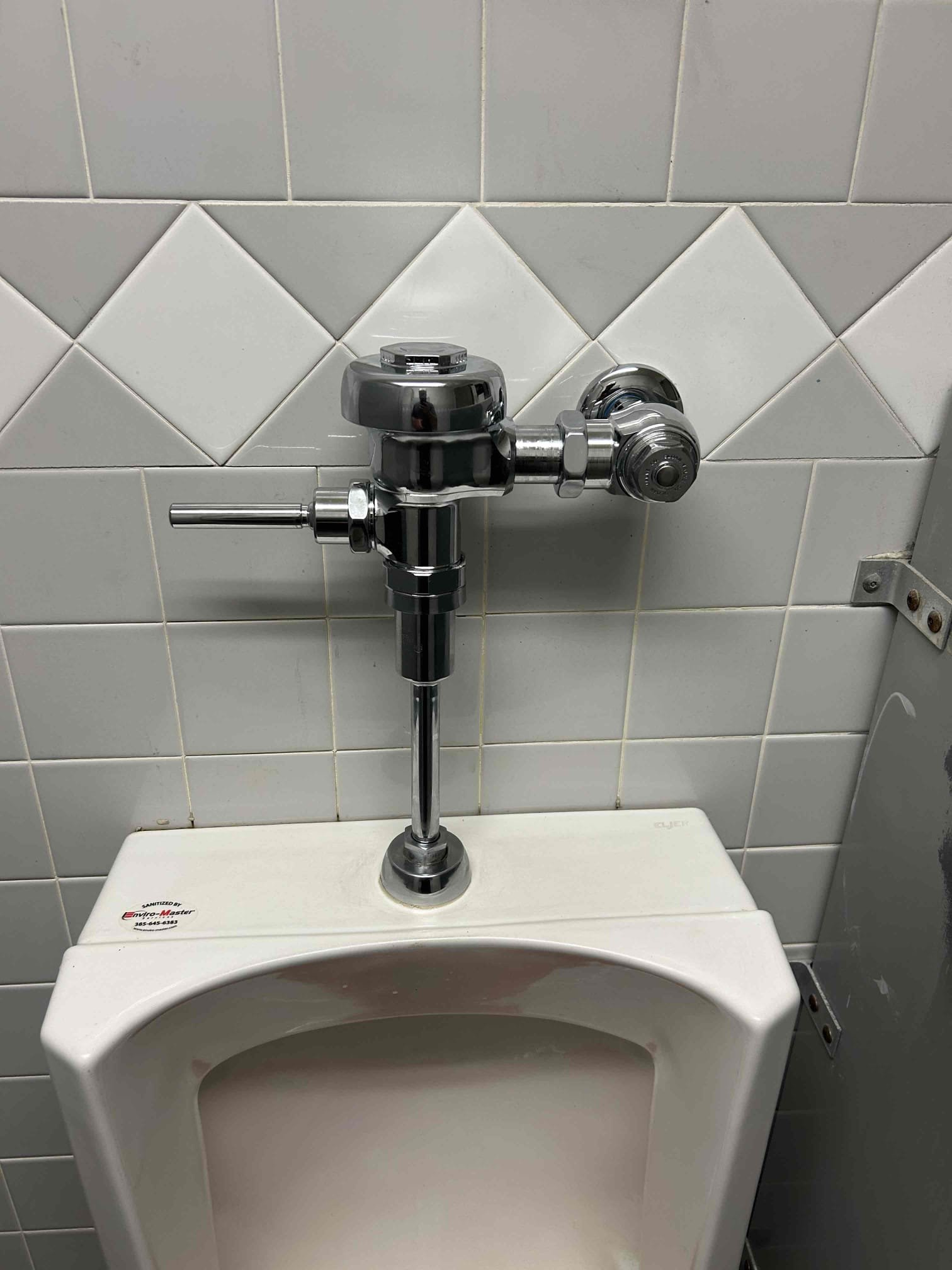 Clogged bathroom sink in need of repair and unclogging. Use a bathroom unclogger or call a plumber for bathroom sink repair services.