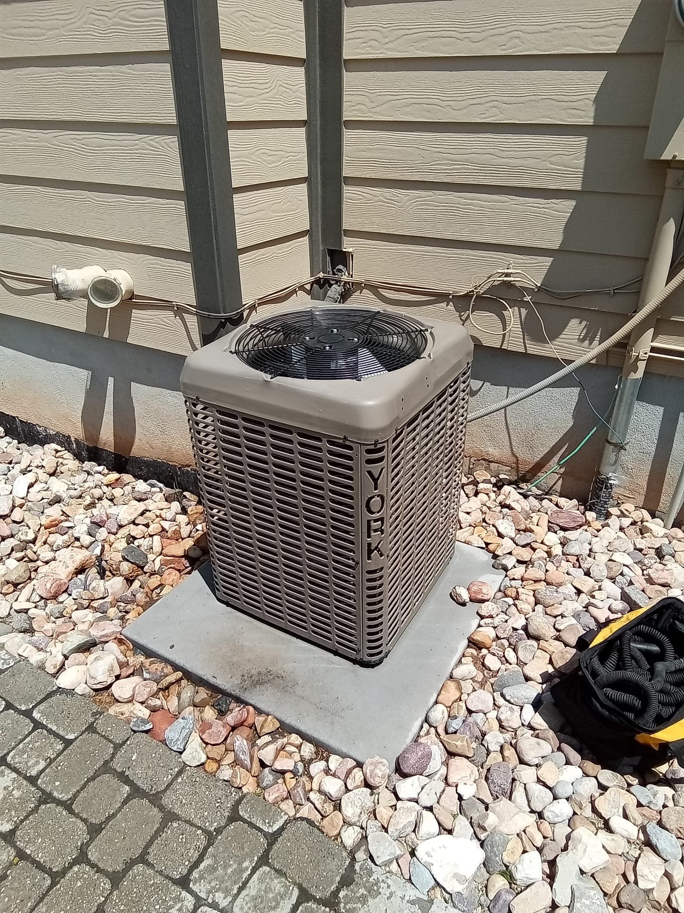 Cost-effective window AC unit, a practical cooling solution for garages or small spaces. Consider commercial AC maintenance for larger or more demanding cooling needs.