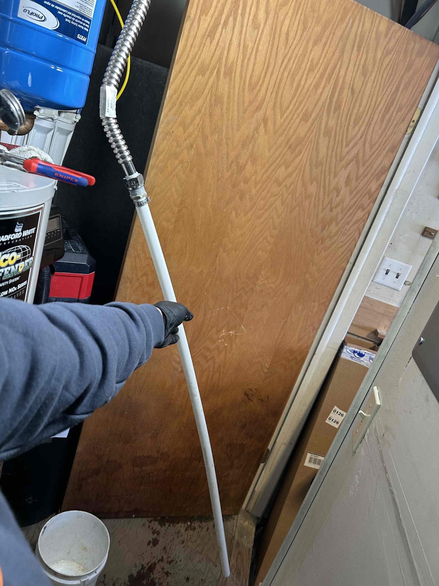 Image depicting the potential consequences of a malfunctioning home water well system. Water damage is visible on a commercial ceiling nearby, suggesting a possible link between the well system failure and water coming through the ceiling. Highlights the importance of well system maintenance to prevent costly water damage.