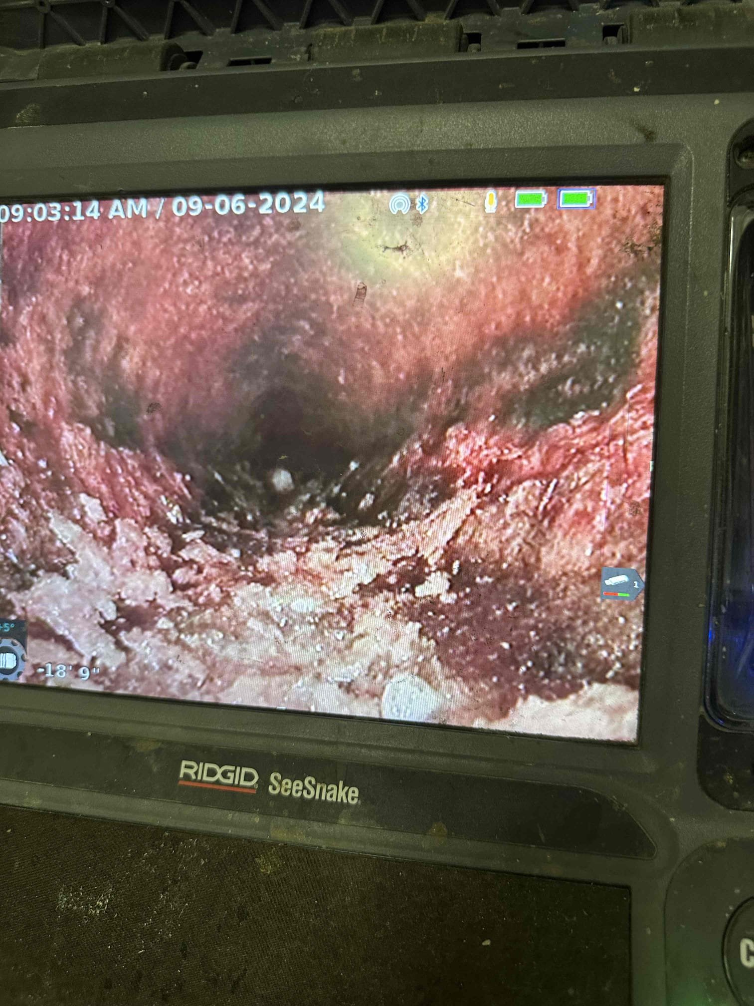 Image depicting a sewer line connection to a house, relevant to sewer pipe locator rental services for identifying the sewer line from house to street. Essential for plumbing, repair, and maintenance.