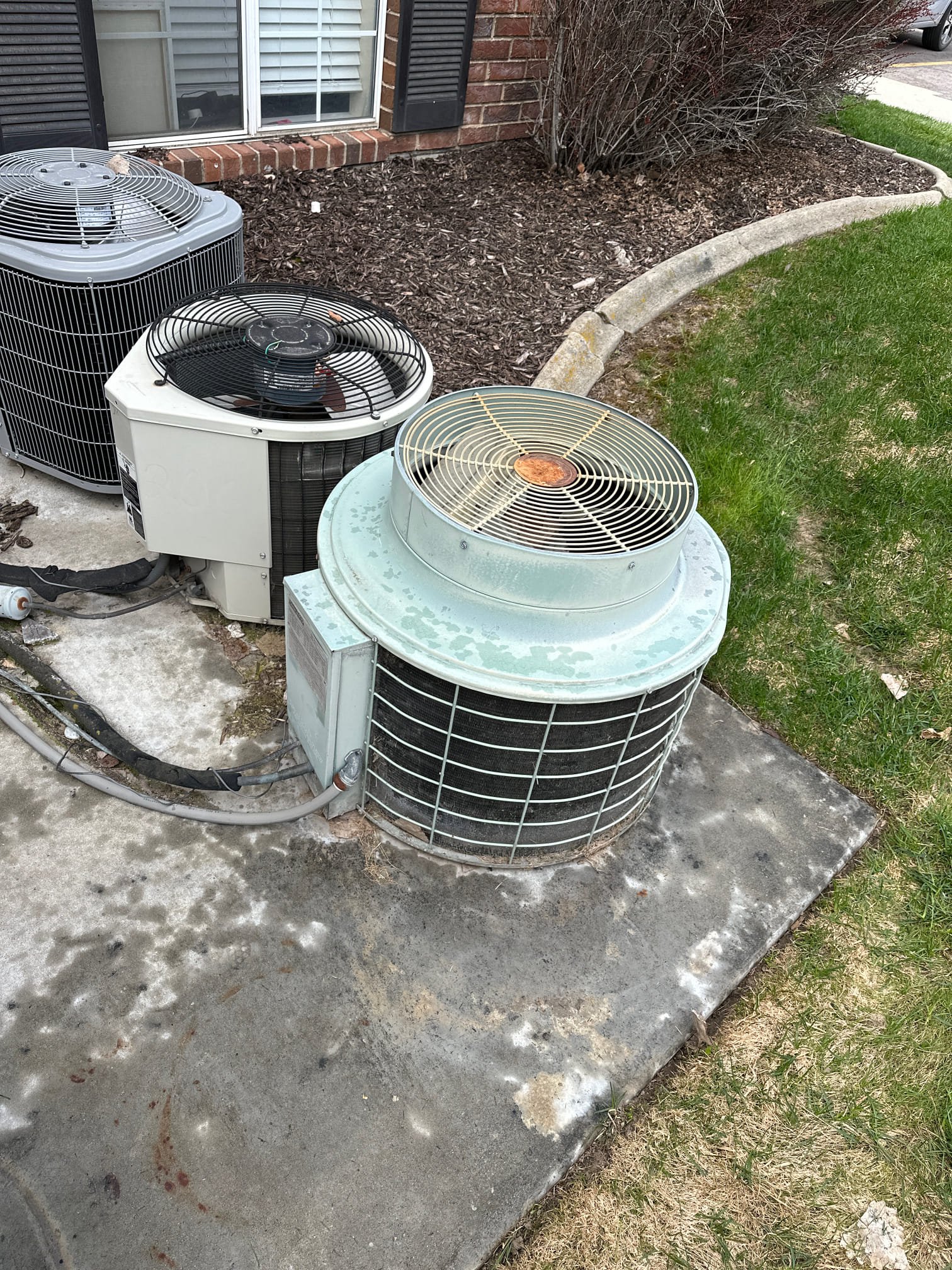 Close-up of a clogged central air filter, covered in trapped hair and dust. Regular central air tune-ups and inspections help prevent this buildup, improving air quality and system efficiency.