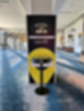 Event phone charging station set up at a national conference with custom event branding