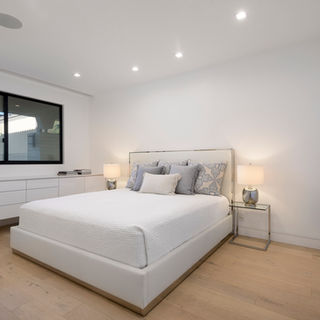 Primary bedroom in  remodeled Montecito condo
