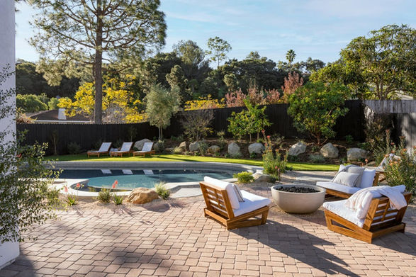 Backyard with pool and fire pit in Spanish Style home in Santa Barbara CA