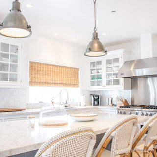 Remodeled kitchen with island in Montecito home