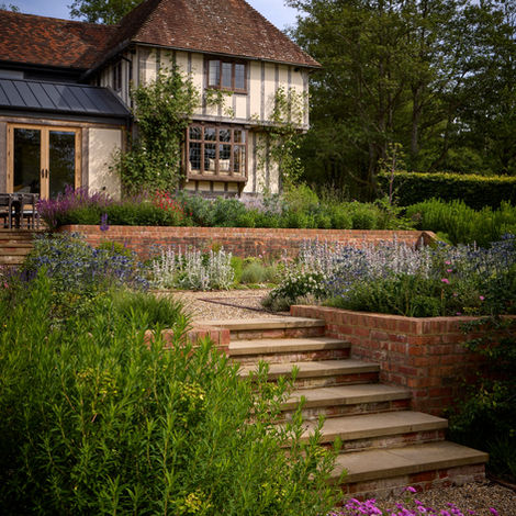 Country period property with terraces going down to the wider garden.