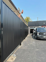 Solid steel fence Commercial.jpg
