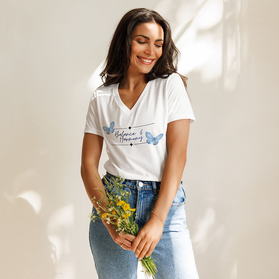 Woman in a v-neck t-shirt with graphic of butterflies and text