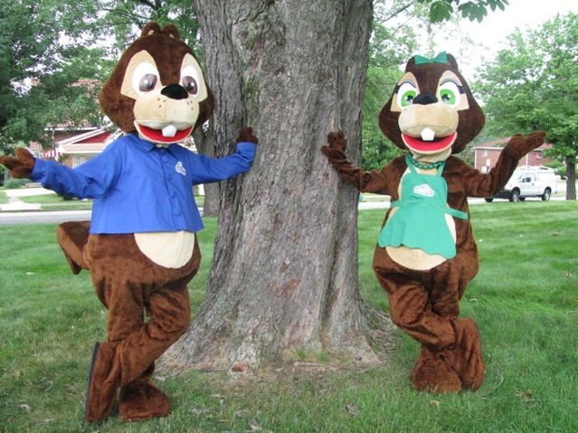 JB Green Team mascots in front of a tree