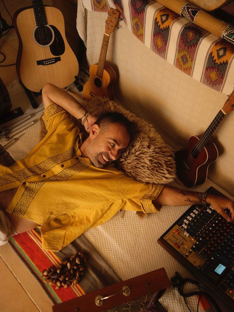 Musician at conscious retreats Mallorca with instruments.