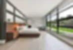 Modern bedroom with large windows, luxury interior design