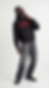 Man in black BROOKLYN hoodie and washed jeans