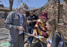 Ray, Andrew, Max, and Malin planning a dive