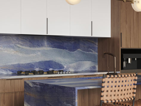 modern kitchen with blue quartzite counters and mitered finishes