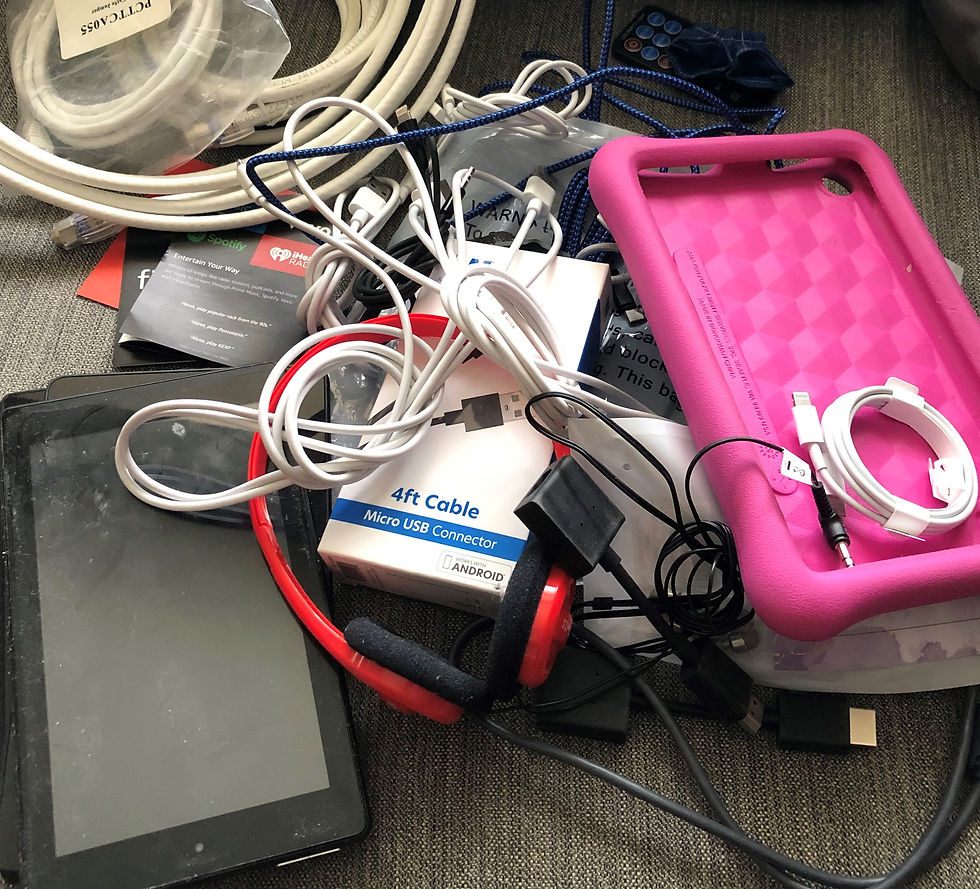 pile of cords and electronics
