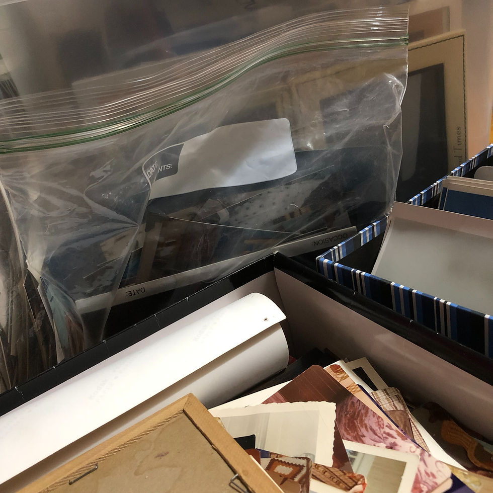 boxes, bags, photo albums and frames - examples of items the Nostalgia Navigator helps you declutter, organize, and digitize