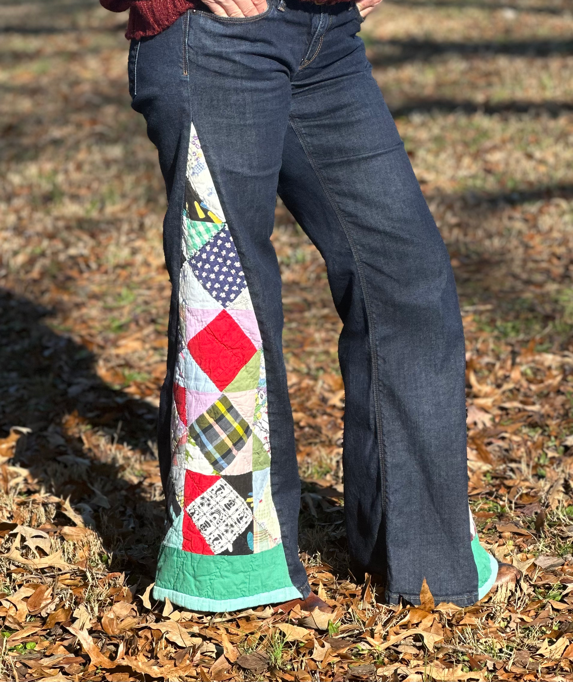Dark blue jeans w/ scrappy quilt panel pants