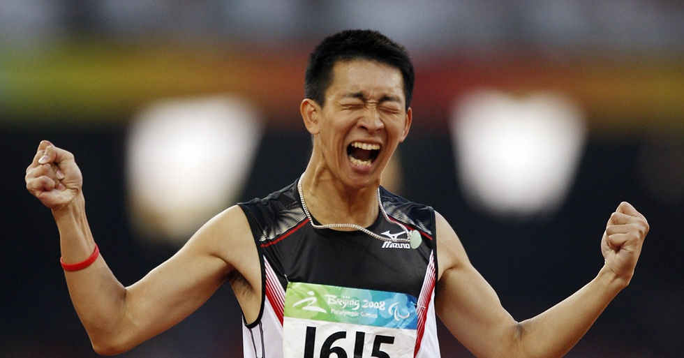 Multi-gold medalist Wai Wai, a champion para-athlete, smiles in competition gear.