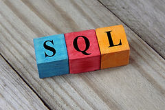SQL text (Structured Query Language) on colorful wooden cubes.jpg