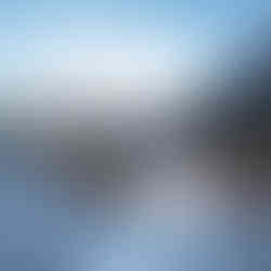 Michael February surfing a longboard at Muizenberg in Cape Town, South Africa