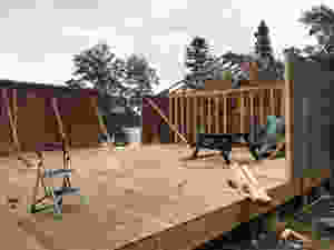 Recycled building materials for walls and trusses of diy cabin build offgrid