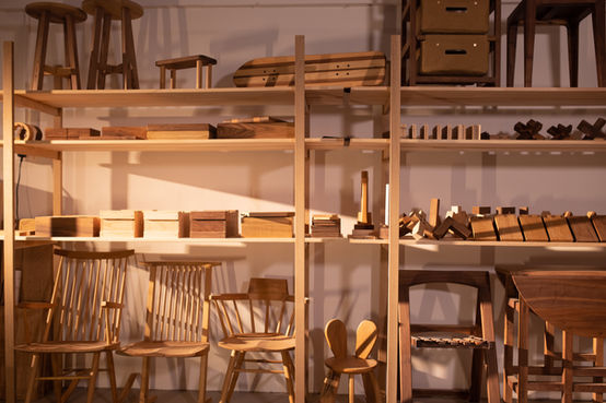 Woodwork & furniture display with joints, boxes, chairs created by Hong Kong Yat Muk Studio