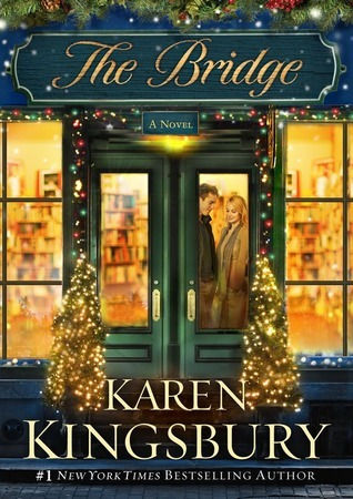 A couple stands inside a warmly lit bookstore decorated for Christmas. The title is above the door and the author's name is below