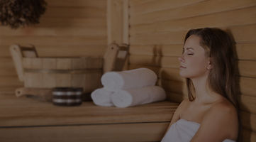 Woman Relaxing Sauna_edited.jpg