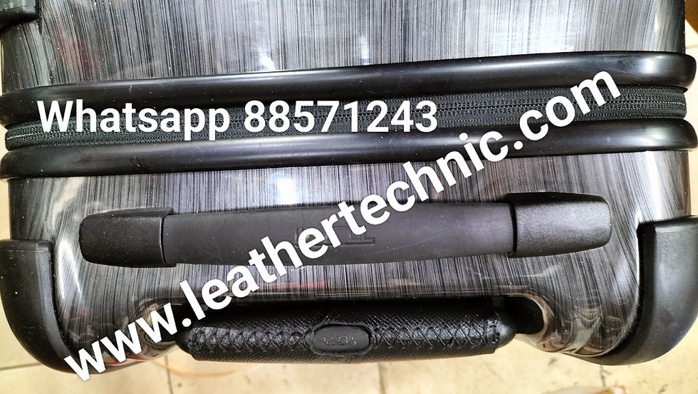 Tumi luggage with retractable handle bar professionally wrapped in top grain leather 