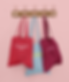mockup-of-three-customizable-tote-bags-hanging-against-a-solid-color-wall-41717-r-el2.png