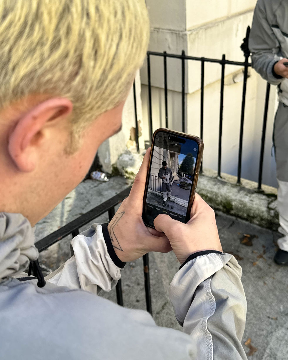close up of model taking photo wearing nike