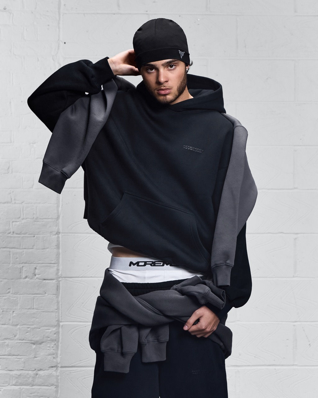 More Money More Love model wearing tracksuit