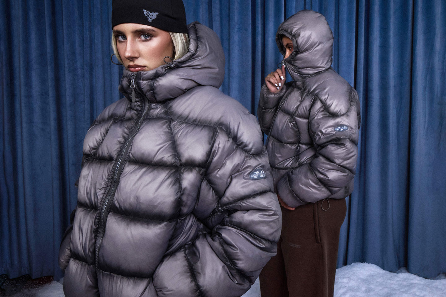 More Money More Love duo wearing puffers