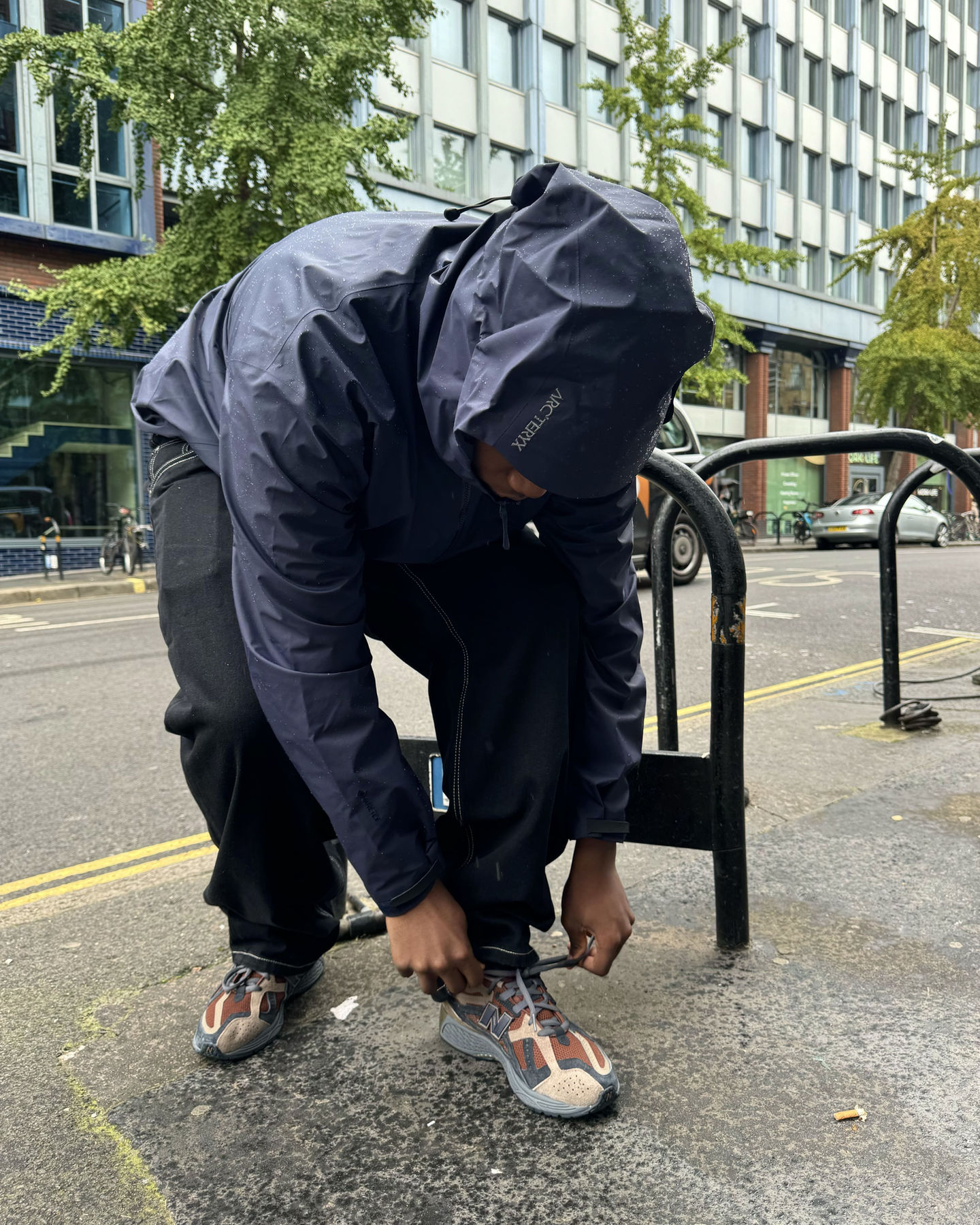 model tying laces in Soho london
