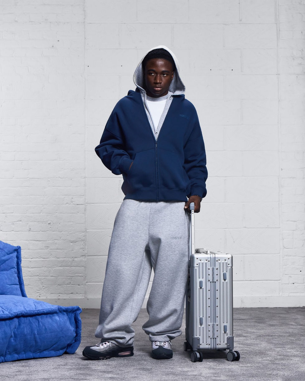 More Money More Love model wearing tracksuit