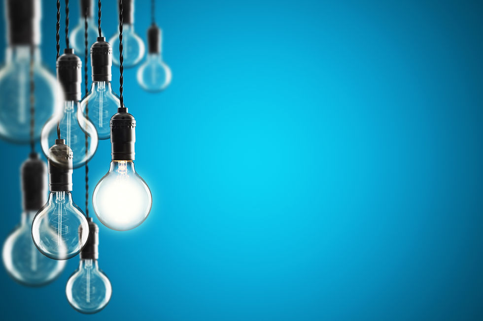 Idea and leadership concept Vintage incandescent Edison type bulbs on color wall.jpg