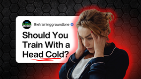 Woman showing mild cold symptoms while thinking about whether to exercise.